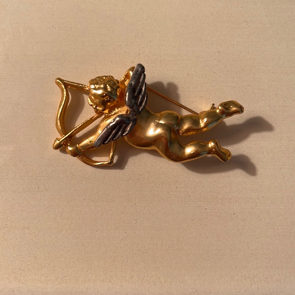 Cupid silver and gold brooch